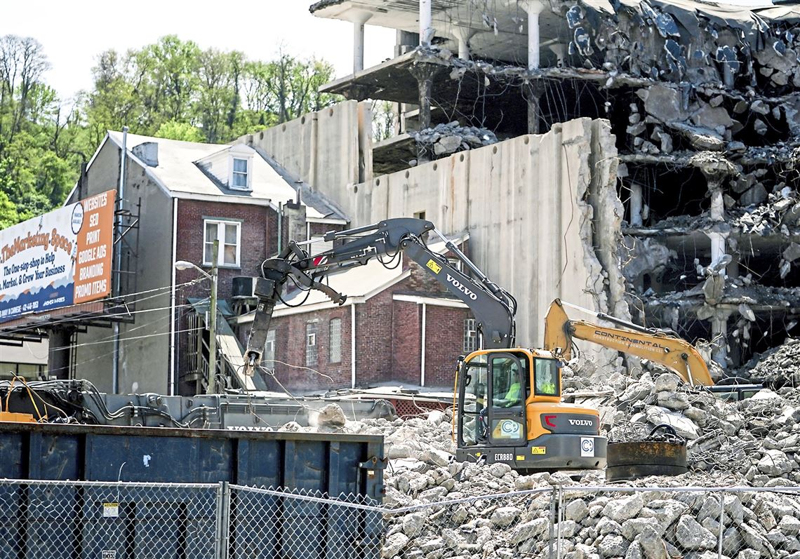 Developer tackles the demolition of the brawny New Federal Cold Storage building in the Strip
