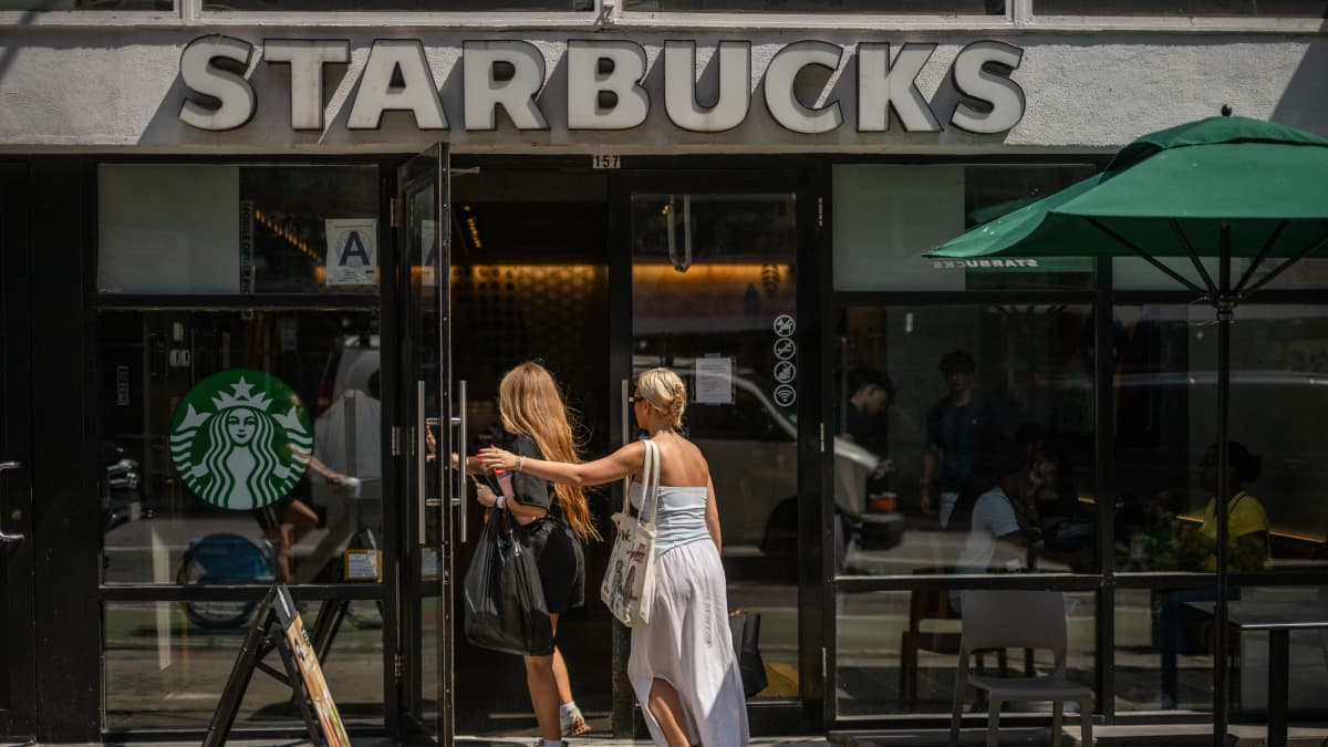 Starbucks to close stores, lay off workers in  billion restructuring