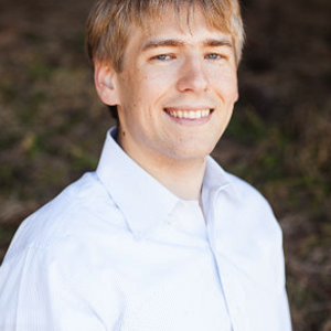 Travis May
